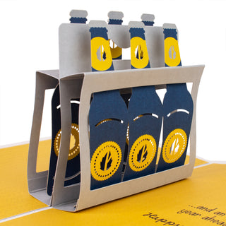 Front view of the six-pack of beer bottles inside the beer birthday pop-up card.