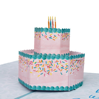 Close-up of the pink and blue two-tier birthday cake details in the birthday cake pop-up card.