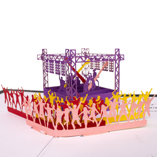 Close-up of the concert stage with lights and a cheering crowd details in the concert birthday pop-up card.