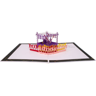 Fully open concert birthday pop-up card with the concert stage with lights and a cheering crowd and printed greeting.